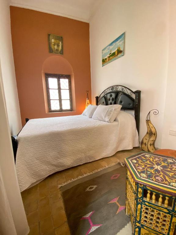 Postel nebo postele na pokoji v ubytování Riad Jbara