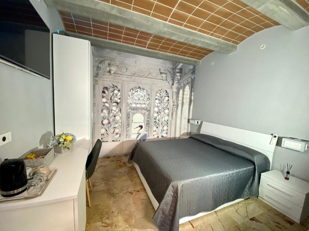 Llit o llits en una habitació de San Marzano Rooms