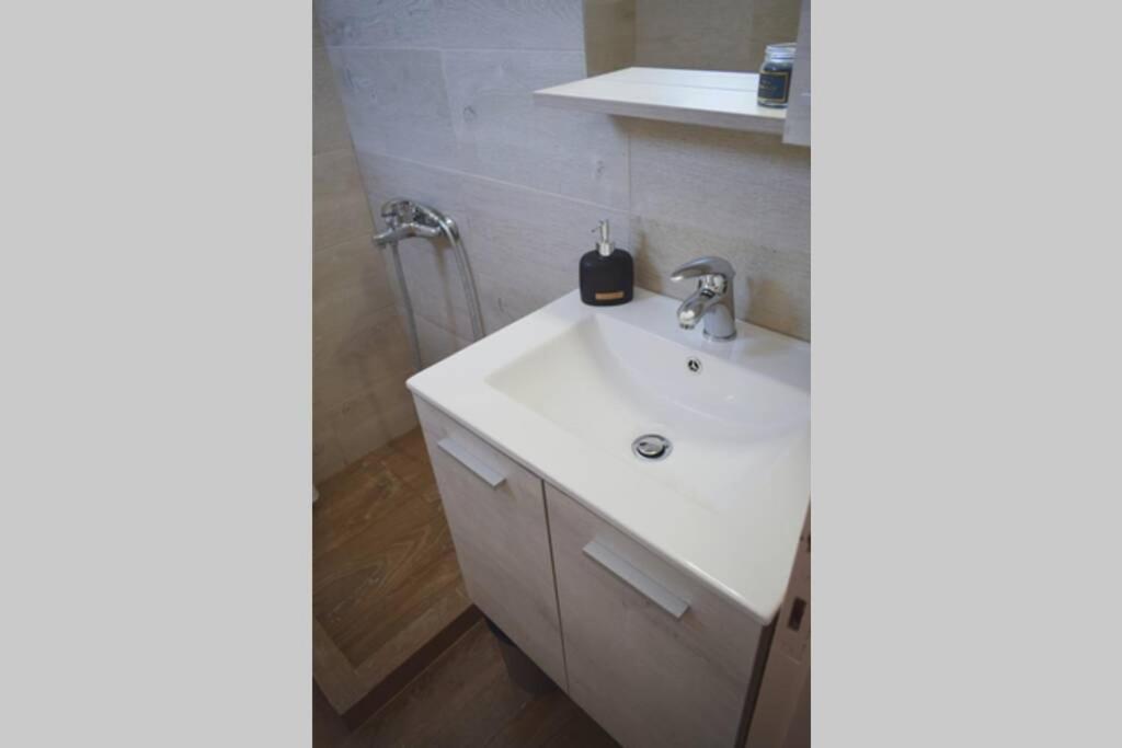 Ванная комната в Meltemi Appartment