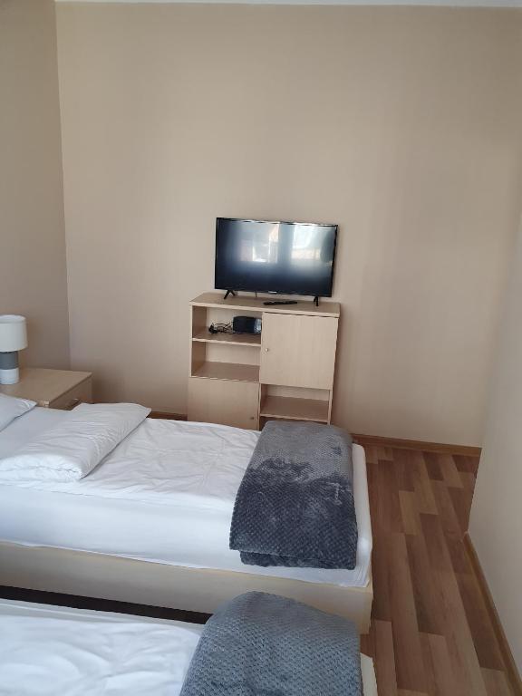 Posteľ alebo postele v izbe v ubytovaní Apartament na Wydmie Ustka