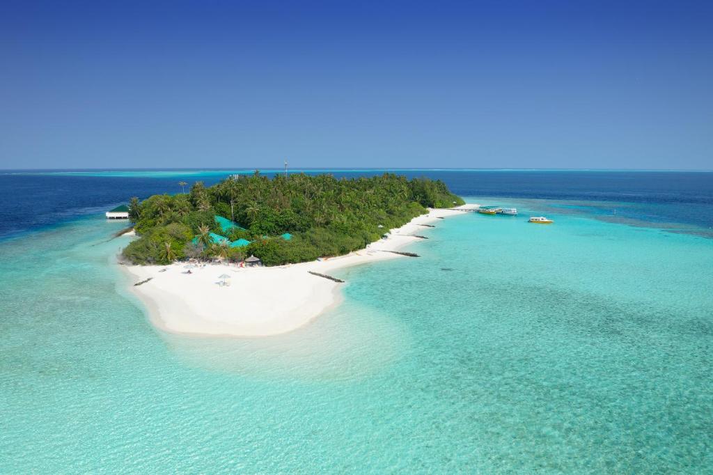 an aerial view of an island in the ocean at Embudu Village Resort in South Male Atoll