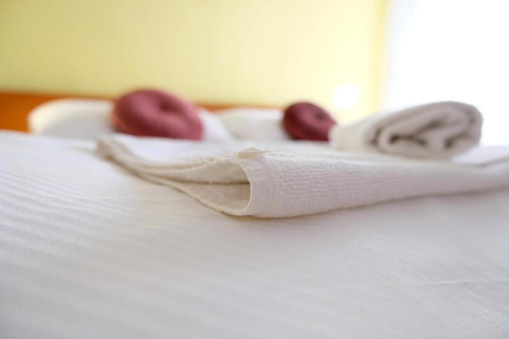 Posteľ alebo postele v izbe v ubytovaní Art Hotel