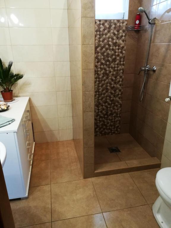 Kúpeľňa v ubytovaní Csaba apartman