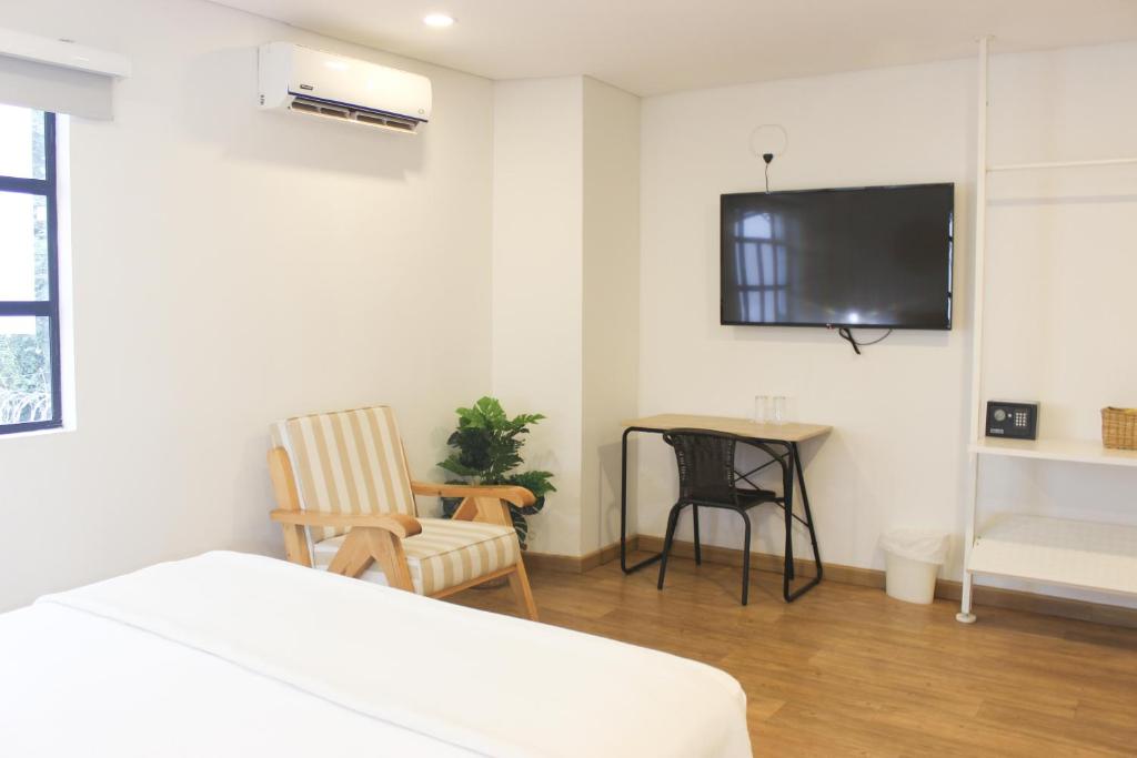 TV a/nebo společenská místnost v ubytování 574 Hotel
