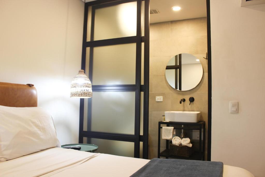 Postel nebo postele na pokoji v ubytování 574 Hotel