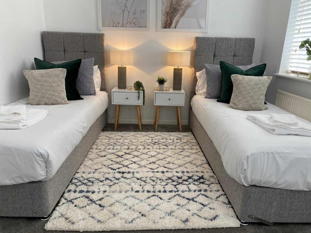 Voodi või voodid majutusasutuse Sutton Heath Lodge toas