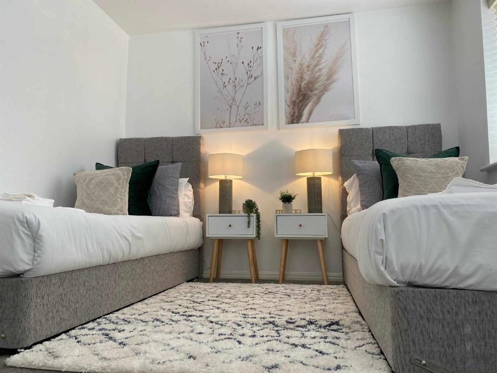 Voodi või voodid majutusasutuse Sutton Heath Lodge toas