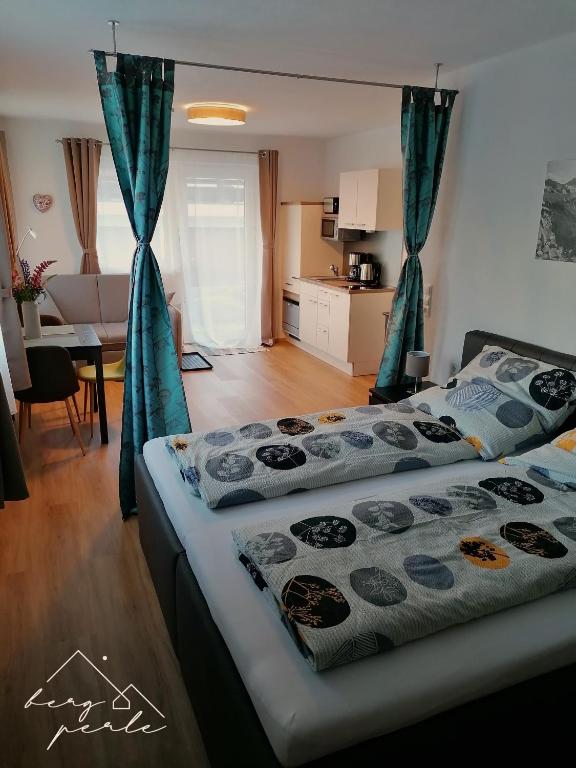 Bergperle Apartments & Mountain Sport - Appartement Met Uitzicht Op De Bergen