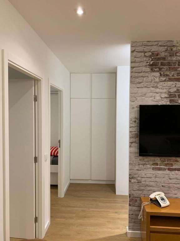 TV a/nebo společenská místnost v ubytování Palace House Apartment