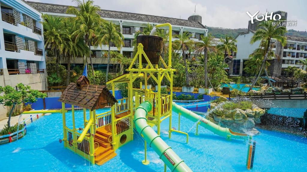 a water park at a resort with a water slide at Yoho Beach Resort Kenting in Hengchun