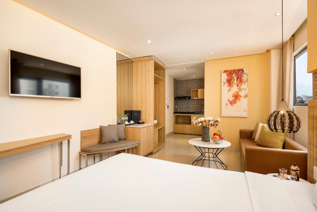 Kuchyň nebo kuchyňský kout v ubytování Bella Merry Hotel and Apartment