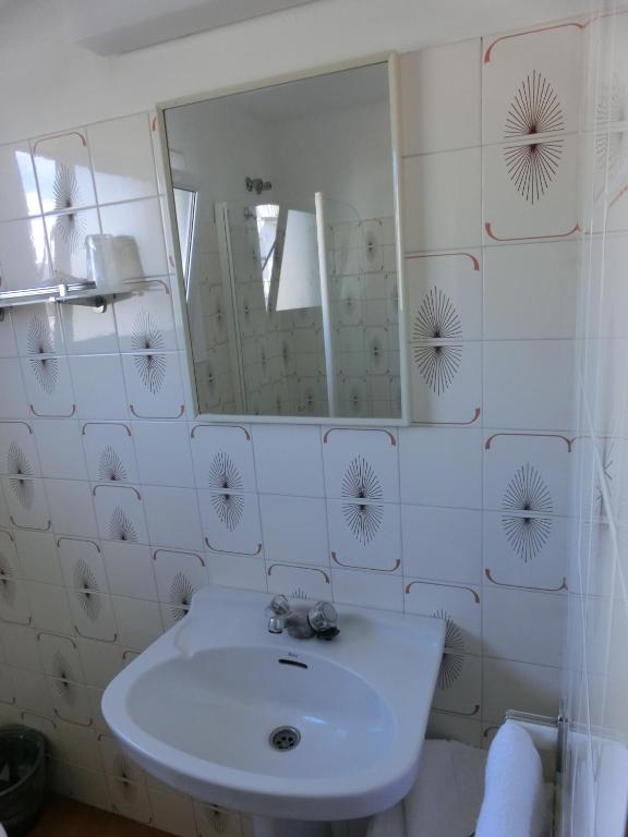 Koupelna v ubytování Hotel Can Català
