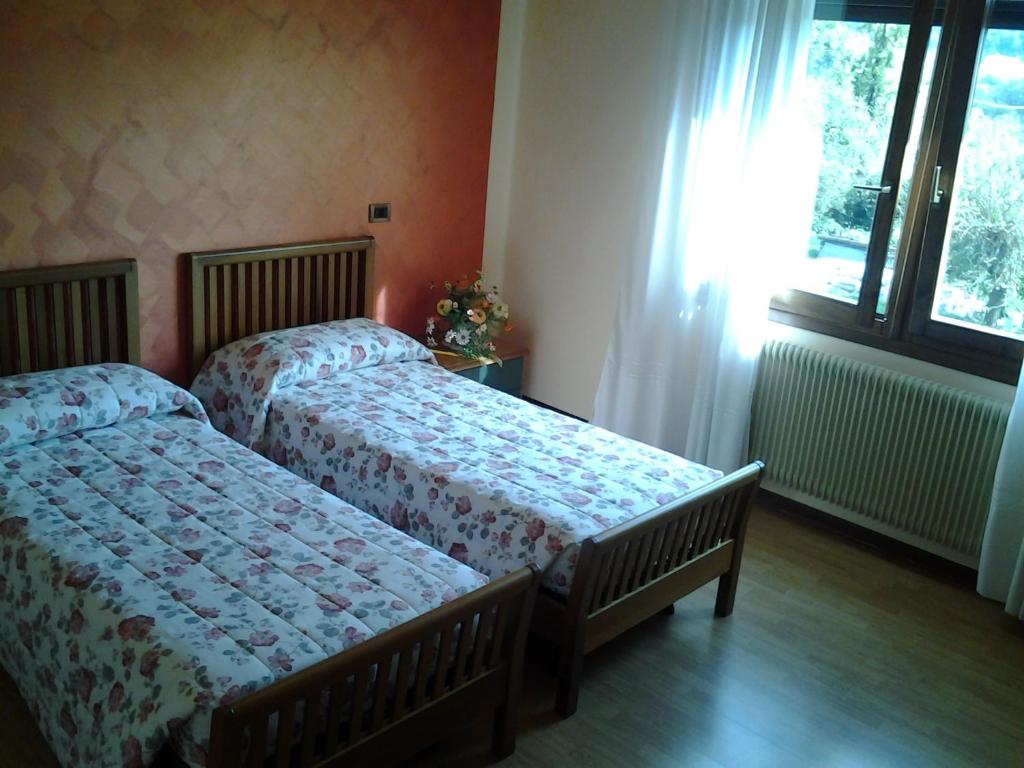 Postel nebo postele na pokoji v ubytování B&B La Palanca
