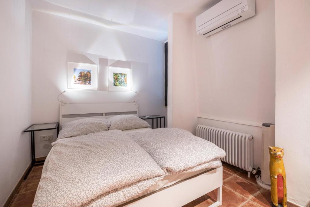 Łóżko lub łóżka w pokoju w obiekcie Villa Bianca