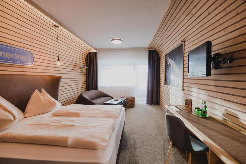 Postel nebo postele na pokoji v ubytování Gasthof Berghof