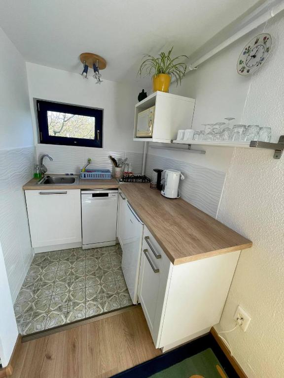 Kuchnia lub aneks kuchenny w obiekcie Jorgos Apartman