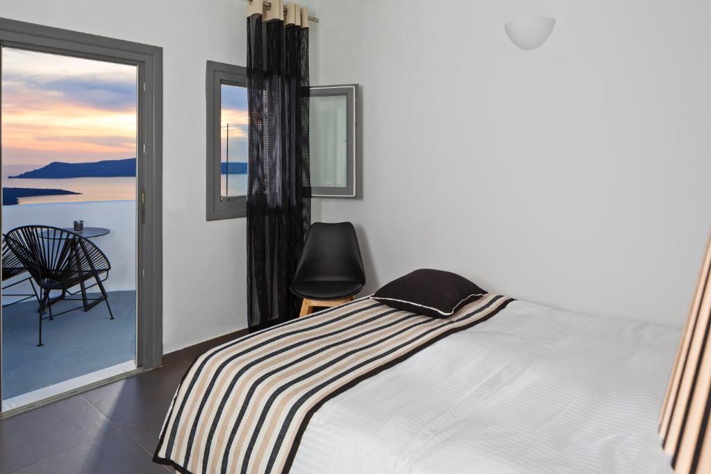 Postel nebo postele na pokoji v ubytování Aroma Suites