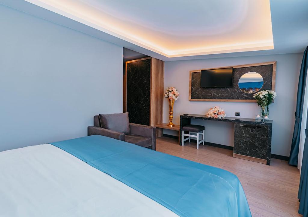 Postel nebo postele na pokoji v ubytování City Port Hotel Trabzon