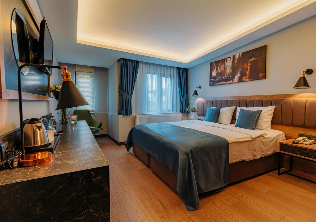 Postel nebo postele na pokoji v ubytování City Port Hotel Trabzon