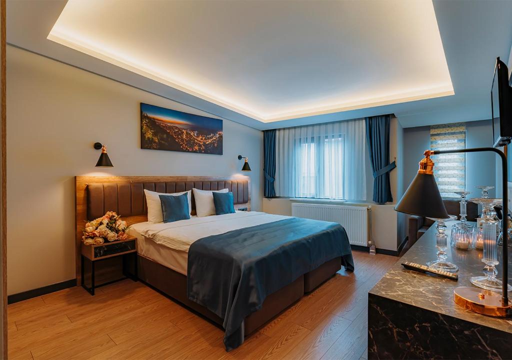 Postel nebo postele na pokoji v ubytování City Port Hotel Trabzon