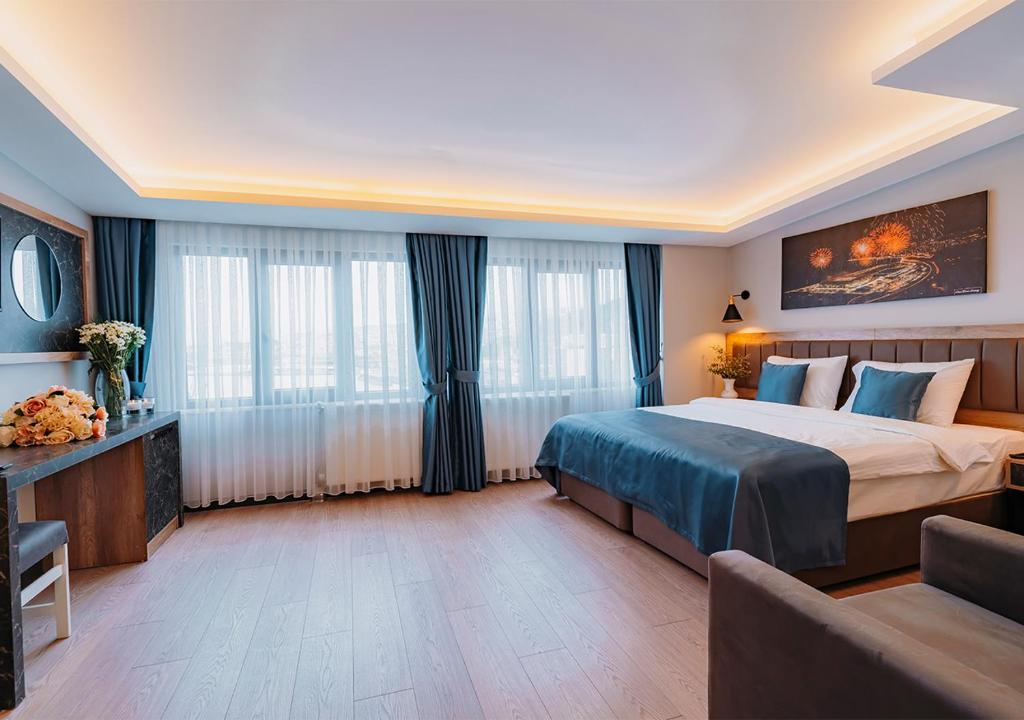 Postel nebo postele na pokoji v ubytování City Port Hotel Trabzon