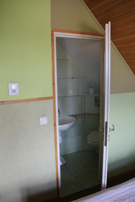 Kúpeľňa v ubytovaní Pensjonacik ELMI