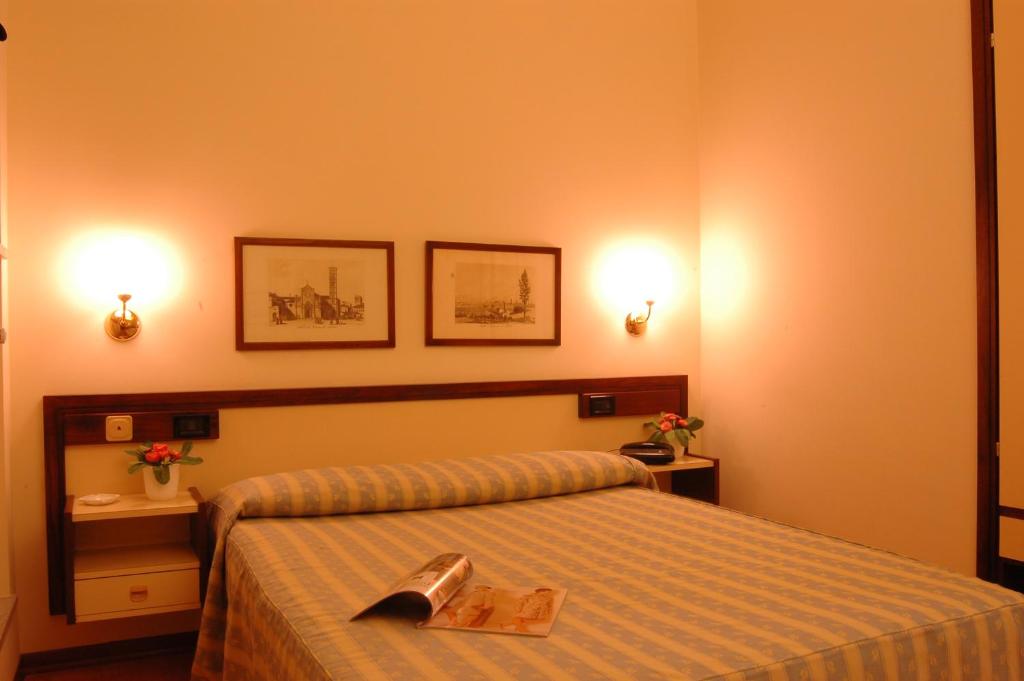 Posteľ alebo postele v izbe v ubytovaní Hotel San Marco