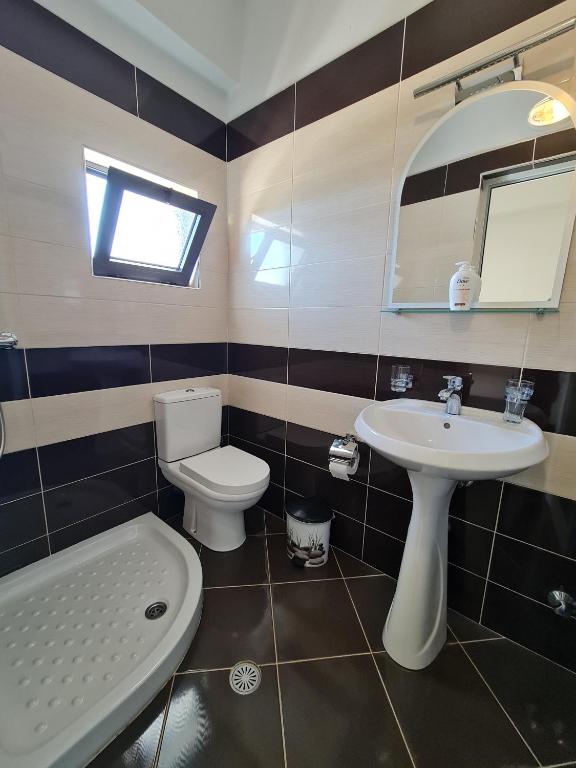 Koupelna v ubytování Hotel Ardiani