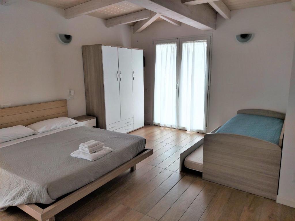 A bed or beds in a room at Antares