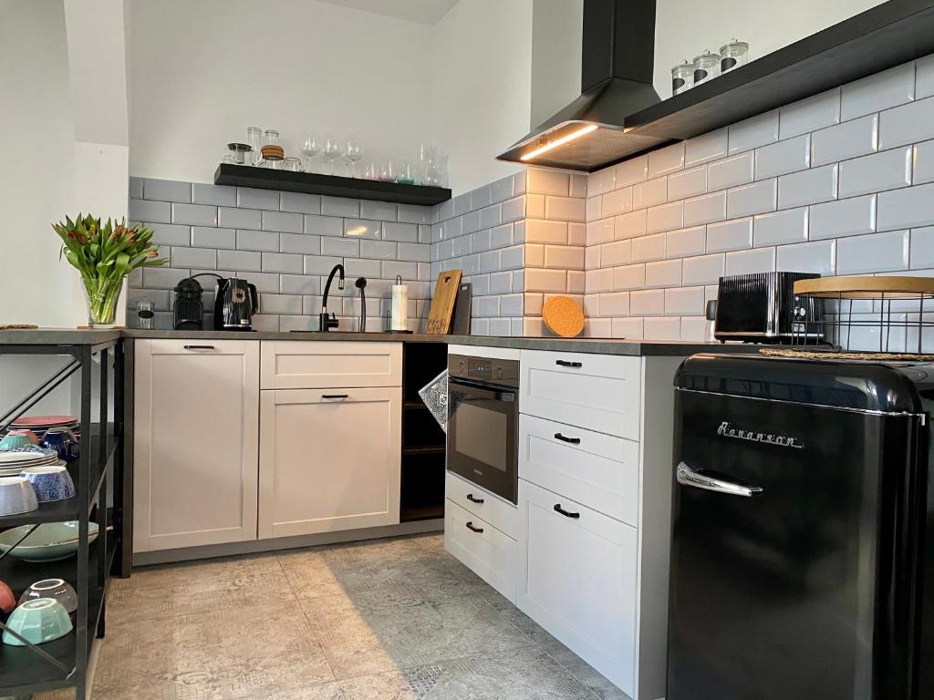 Kuchyňa alebo kuchynka v ubytovaní apartament Hrabala