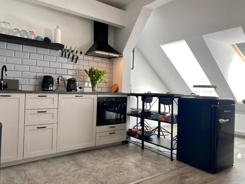 Kuchyňa alebo kuchynka v ubytovaní apartament Hrabala