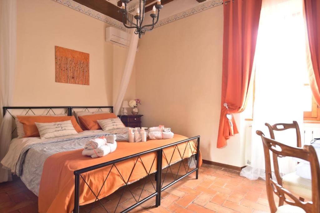 Postel nebo postele na pokoji v ubytování Il Giglio B&B