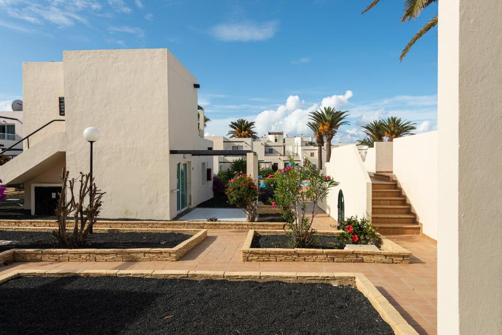 HomeforGuest Apartamento con terraza y piscina en Corralejo - Departamento