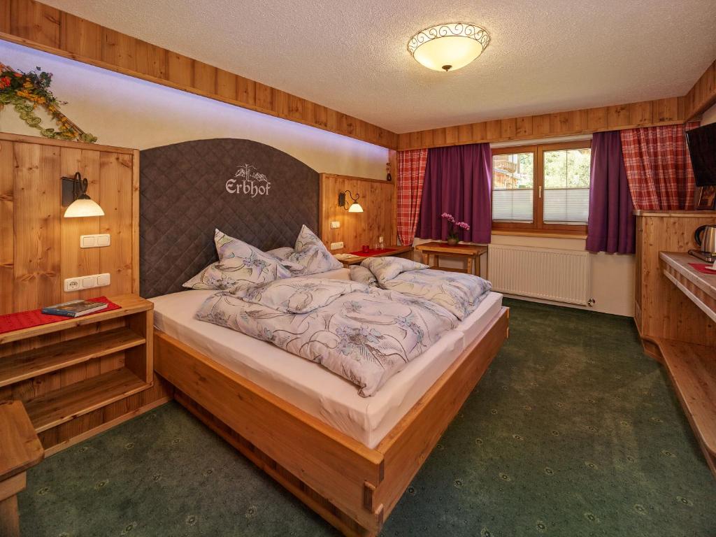Postel nebo postele na pokoji v ubytování Haus Erbhof