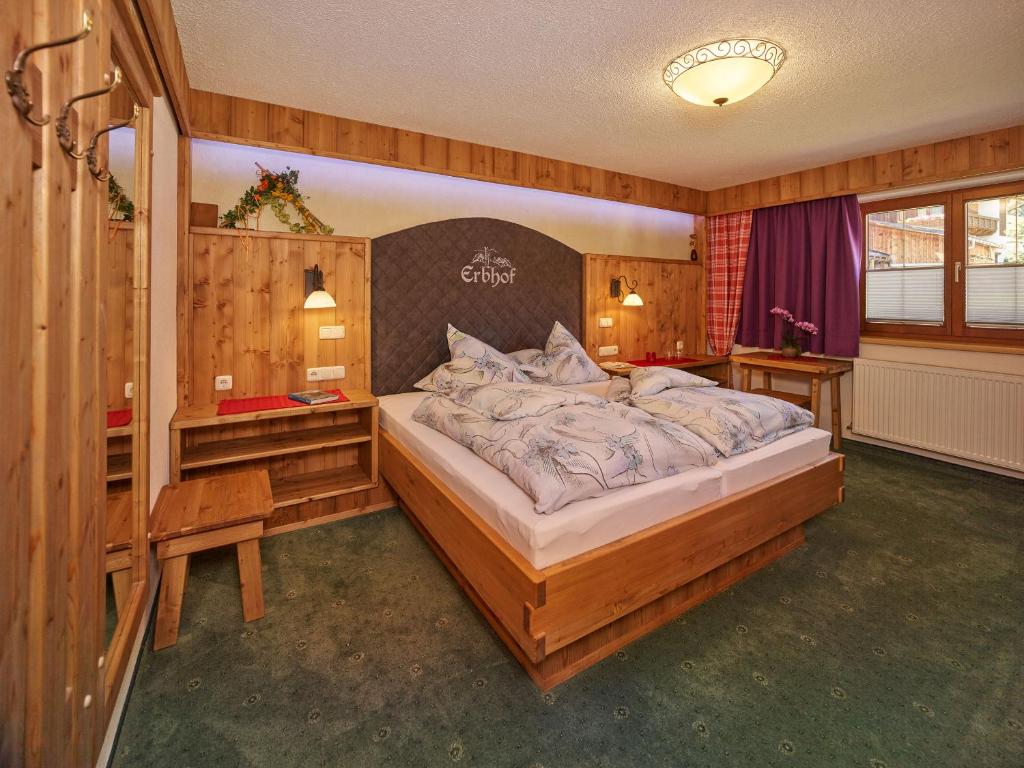 Postel nebo postele na pokoji v ubytování Haus Erbhof