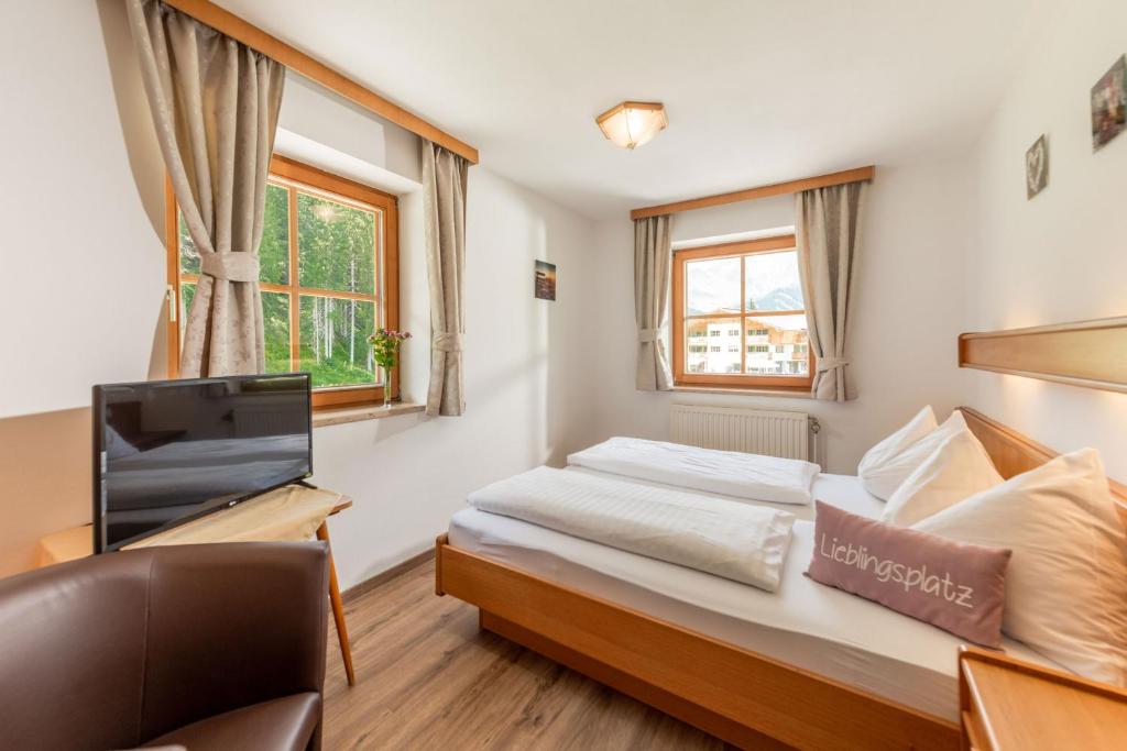 Postel nebo postele na pokoji v ubytování Aparthotel Lieblingsplatz