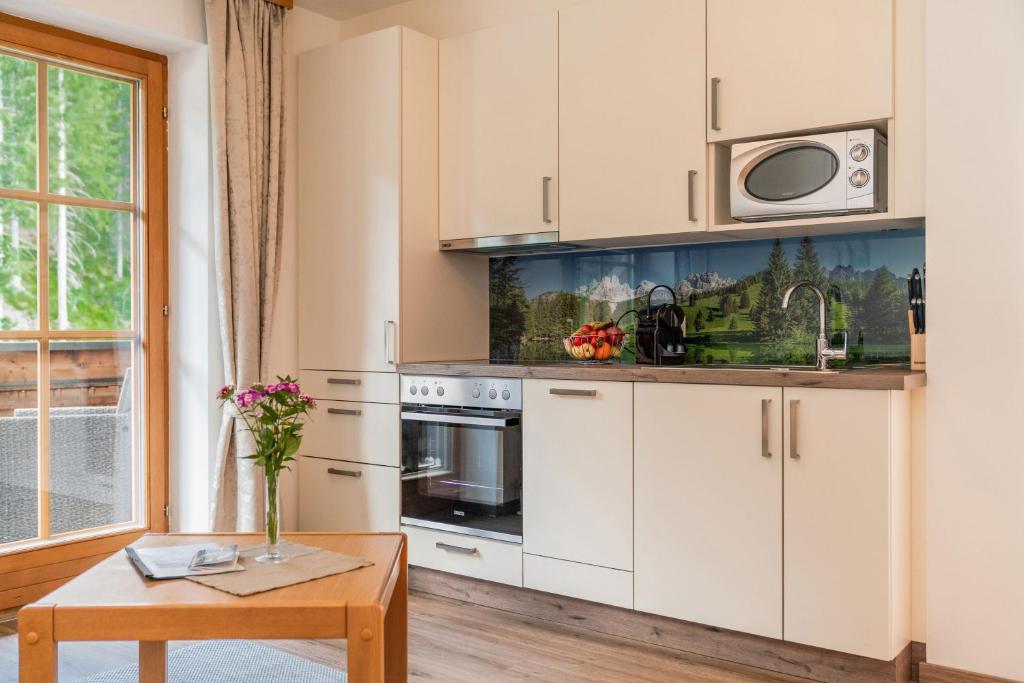 Kuchyň nebo kuchyňský kout v ubytování Aparthotel Lieblingsplatz