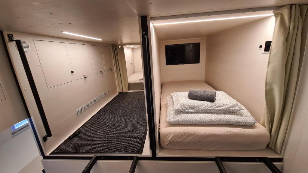 Postel nebo postele na pokoji v ubytování Cabin HOSTEL
