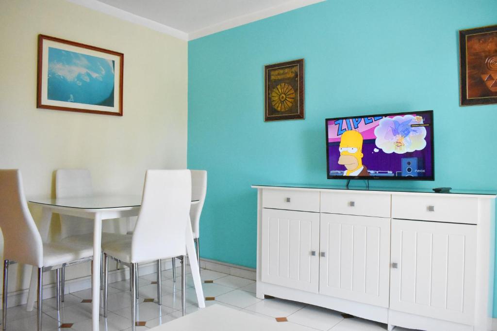 TV a/nebo společenská místnost v ubytování Dunaoasis Maspalomas
