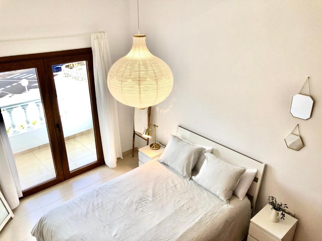Posteľ alebo postele v izbe v ubytovaní Casa La Juyona