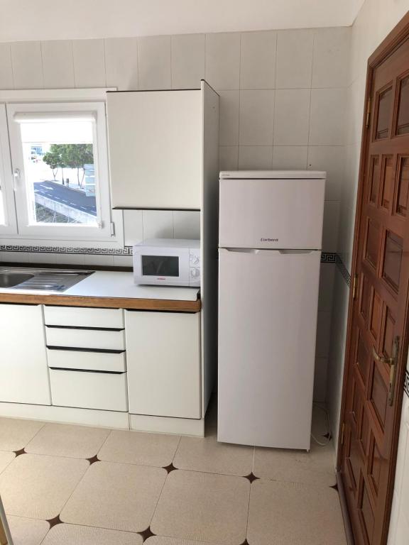 Kuchyňa alebo kuchynka v ubytovaní Casa La Juyona
