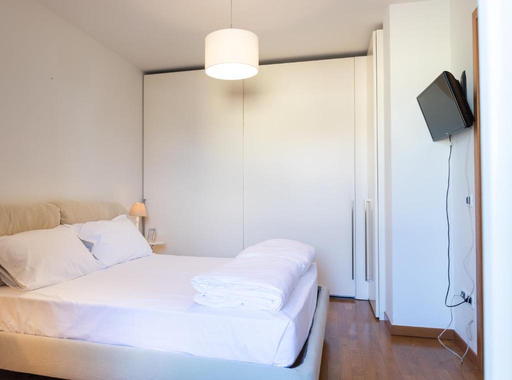 Postel nebo postele na pokoji v ubytování Appartamento Borgo Peschiere