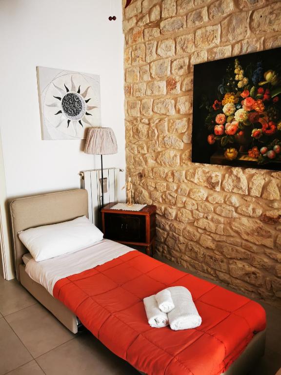 Posteľ alebo postele v izbe v ubytovaní Casa Vacanze Le Giuseppine
