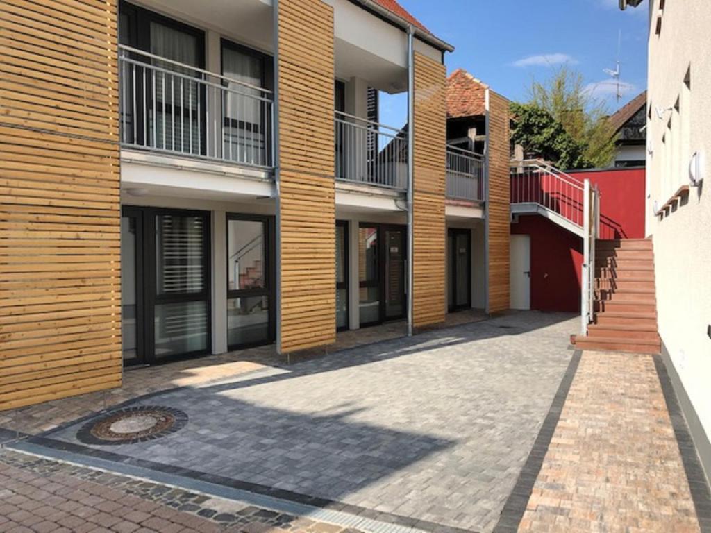 a row of buildings on a brick street at WeinMotel Simon 1 a in Alzenau