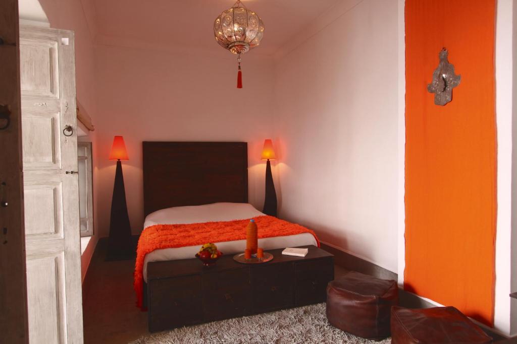Postel nebo postele na pokoji v ubytování Riad O2