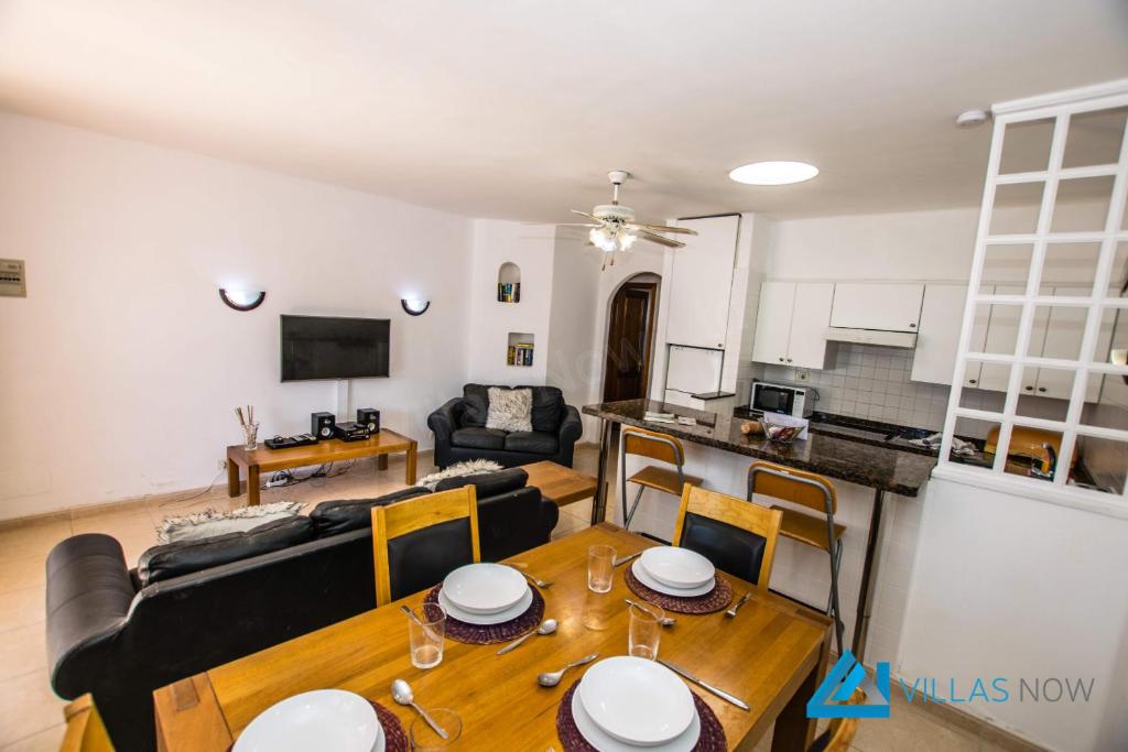 A television and/or entertainment centre at Las Brisas 112 - LH1033 By Villas Now Ltd
