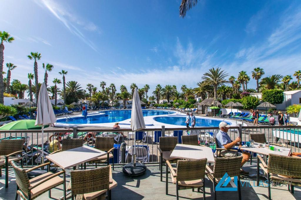 The swimming pool at or close to Las Brisas 112 - LH1033 By Villas Now Ltd