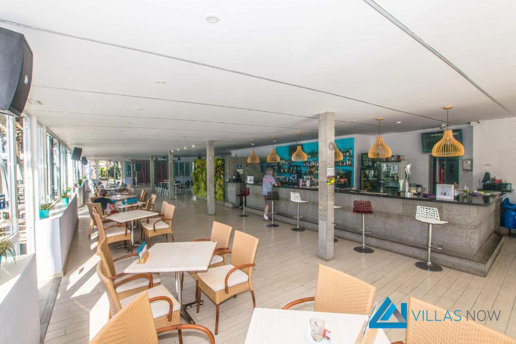 A restaurant or other place to eat at Las Brisas 112 - LH1033 By Villas Now Ltd
