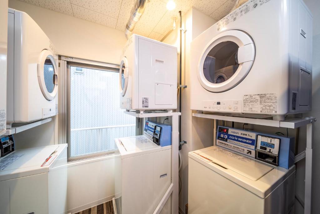 Kuchyň nebo kuchyňský kout v ubytování Super Hotel Hiroshima Yagenboridori