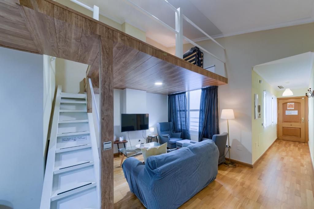 Televízia a/alebo spoločenská miestnosť v ubytovaní Holidays2Malaga Soho Penthouse